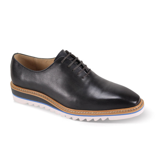 The Giovanni Ruben Charcoal Leather Shoes by GIOVANNI, featuring brown accents and a white ridged sole, exemplify the perfect blend of style and practicality in modern footwear, as seen from the side.