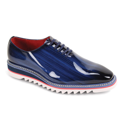 The GIOVANNI Giovanni Ruben Cobalt Patent Leather Shoes feature a glossy blue finish, red lining, blue laces, a lightweight white sole with pink and black trim, plain toe design, and genuine leather construction.