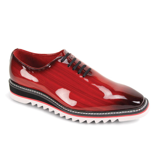 The Giovanni Ruben Red Patent Leather Shoes by GIOVANNI feature glossy red leather, black laces, a black and white ridged lightweight sole, and a pointed toe.