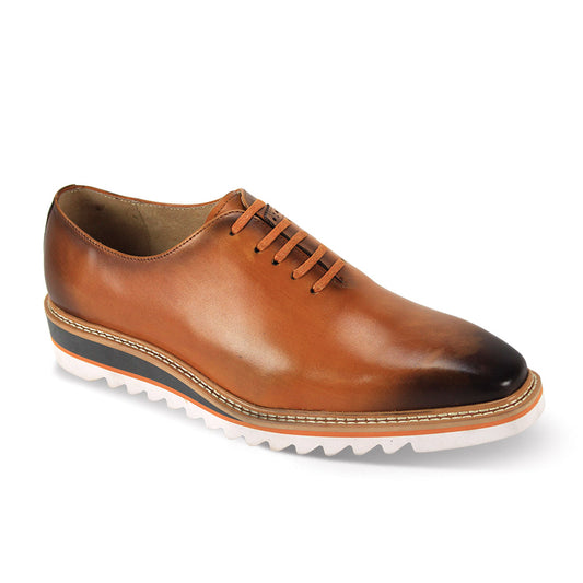 The Giovanni Ruben Tan Leather Shoes by GIOVANNI showcase a gradient effect with a plain toe design, finished with a white serrated sole and an orange accent stripe.