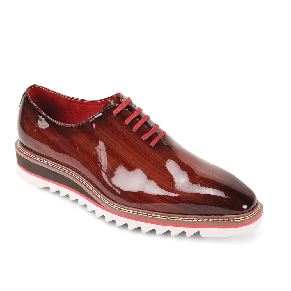 The GIOVANNI Giovanni Ruben Brown Patent Leather Shoes feature a glossy brown finish, red laces and interior, plus a thick lightweight white and brown serrated sole.