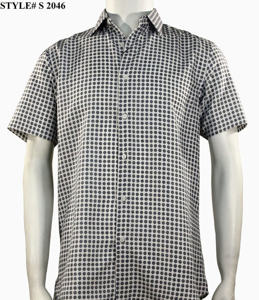 A mannequin showcases the Sangi Short Sleeve Shirt S 2046 by Sangi, featuring a modern fit and small black geometric pattern on white. "STYLE# S 2046" appears in the top left.