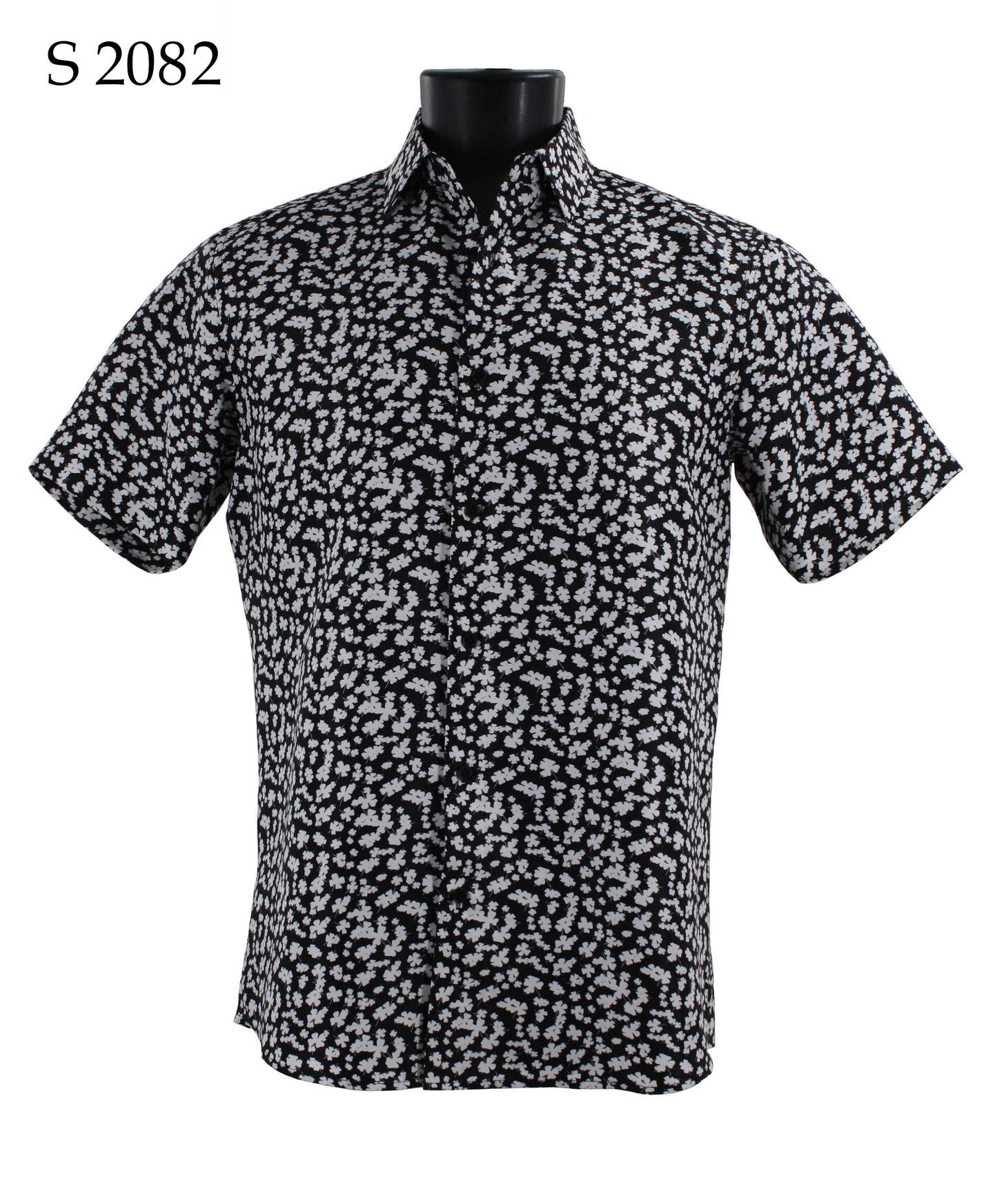 The Sangi Short Sleeve Shirt (S 2082) by Sangi offers a modern fit and features a striking black and white abstract pattern. Displayed on a sleek black mannequin, it perfectly balances style with comfort.
