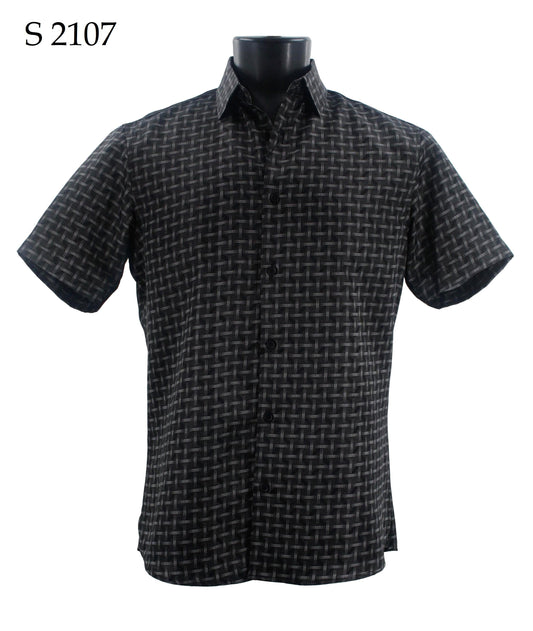 A black mannequin showcases a Sangi Short Sleeve Shirt S 2107, highlighting its modern fit and stylish black and gray checkered pattern with "S 2107" printed in the top left corner.