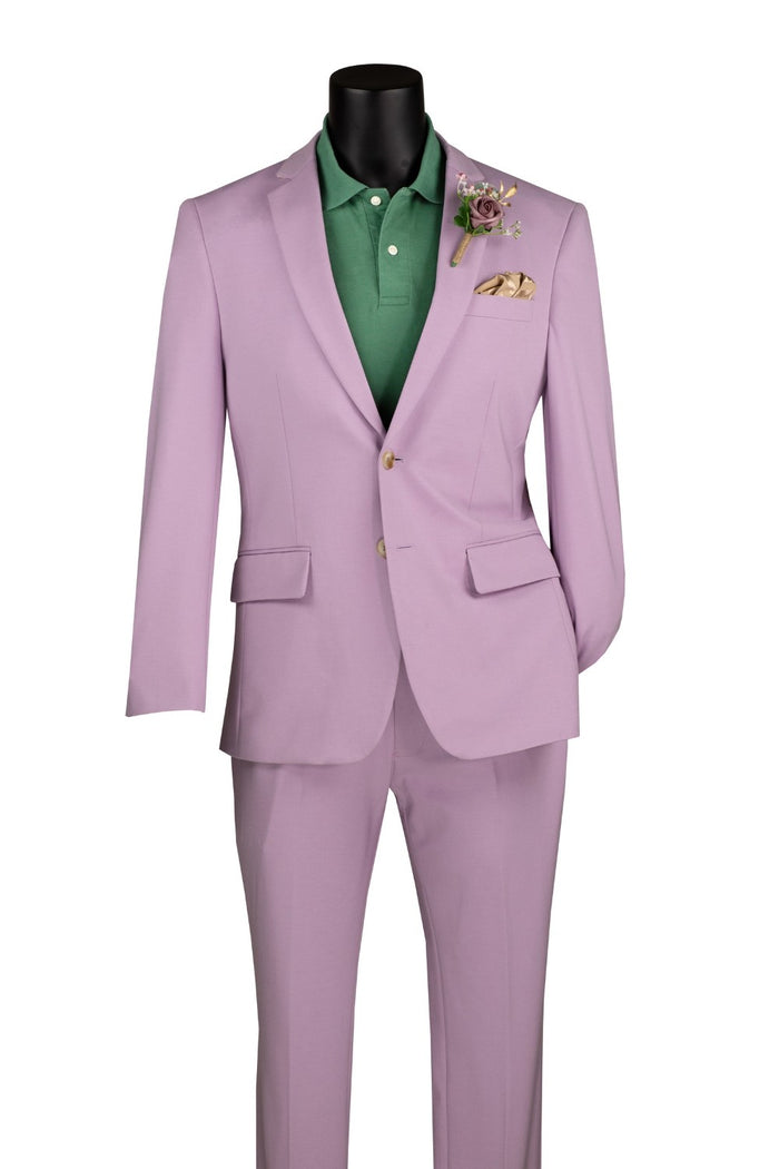 Vinci Suits Slim Fit 2 Piece Suit Stretch Fabric Suit with Adjustable Waistband Lavender SDX-3 worn over a green polo shirt with a boutonniere and pocket square.