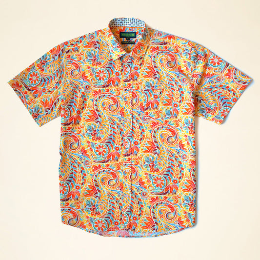 The Inserch SS Paisley Print Shirt SS011-00029 Orange is a short-sleeve premium cotton button-up, featuring a multicolored paisley and floral pattern in red, yellow, blue, and green, shown laid flat on a light background.