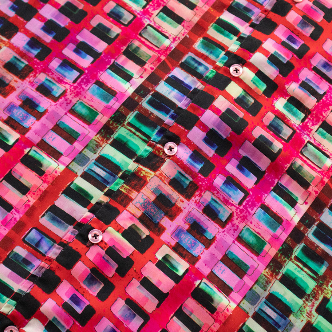 The Inserch SS Geo Print Shirt SS013-00066 Multi is a short-sleeved open collar shirt with a vibrant geometric pattern in pink, green, blue, and black from the brand Inserch.