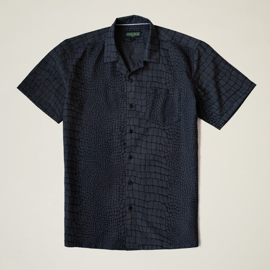 The Inserch SS Alligator Jacquard Shirt (SS014) features a black crocodile skin pattern, short sleeves, and a soft rayon tencel blend. Displayed flat against a light background. Available in 5 colors from Inserch.