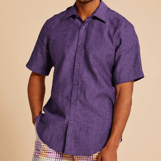 A man stands against a beige background wearing the Inserch Linen 2pc Set (SS717) in Eggplant—a short-sleeve button-up shirt and matching pants from the premium brand, Inserch.