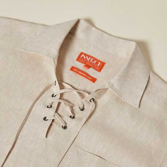 The Inserch SS Linen Lace Front Pullover Shirt (SS811-00006 Oatmeal) is a beige European flax linen shirt with a lace-up v-neck, collar, and red "Inserch Linen Collection" label inside.