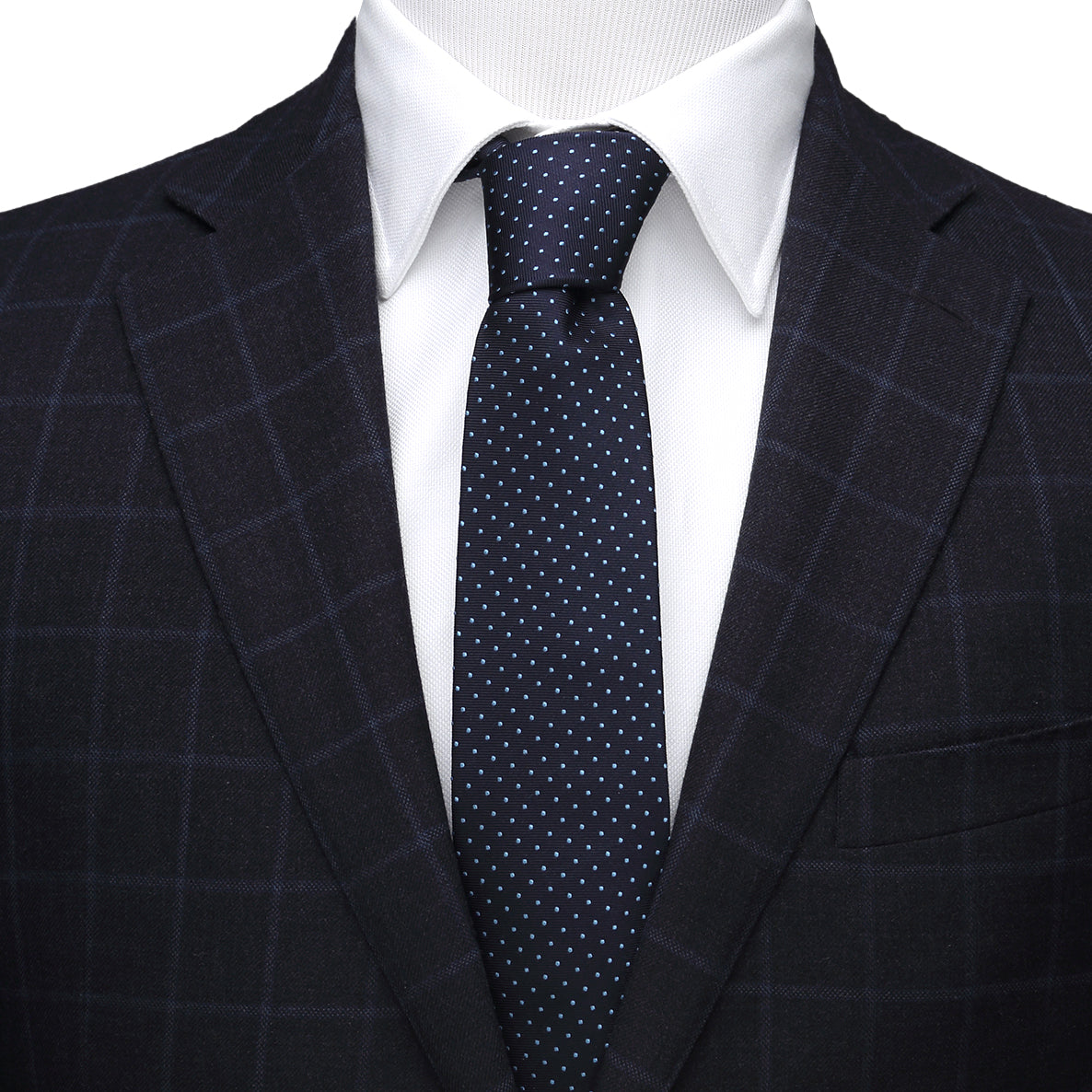 The Star Trek Enterprise Dot Blue Men's Tie by Cufflinks.com features a navy silk design with light blue polka dots and the USS Enterprise, perfect for fans.