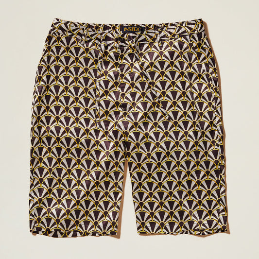 The Inserch Art Nouveau Print Shorts ST051-00001 Black feature a geometric black, gold, and white pattern on shiny satin fabric, shown flat against a light background.
