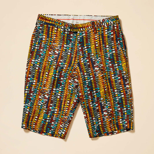 Inserch's ST918-00167 Cacao shorts feature a modern fit with a geometric pattern of red, yellow, blue, and white rectangles on a beige background.