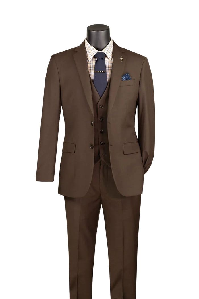 The Slim Fit Suit 3 Piece 2 Button Brown SV2900 by Vinci Suits is displayed on a headless mannequin with a plaid shirt, navy tie, and blue pocket square against a white background.