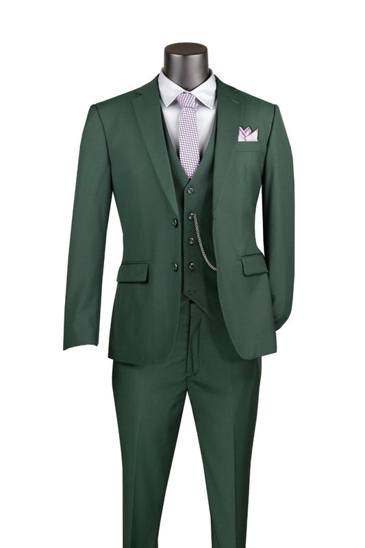 The Slim Fit 3 Piece 2 Button Suit in Hunter Green by Vinci Suits (SV2900) includes a white dress shirt, light purple tie, pocket square, and a vest with a chain accessory for an elegant alternative to a classic tuxedo.