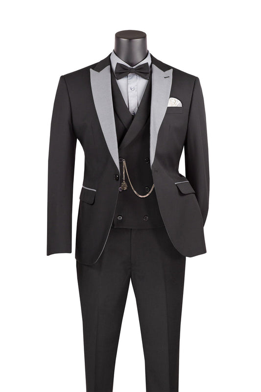 The Vinci Suits Slim Fit 3 Piece Tuxedo Black SV2K-5 features silver peak lapels, a white dress shirt, black bow tie, and pocket square. It includes a vest with a chain accessory for an elegant ensemble.