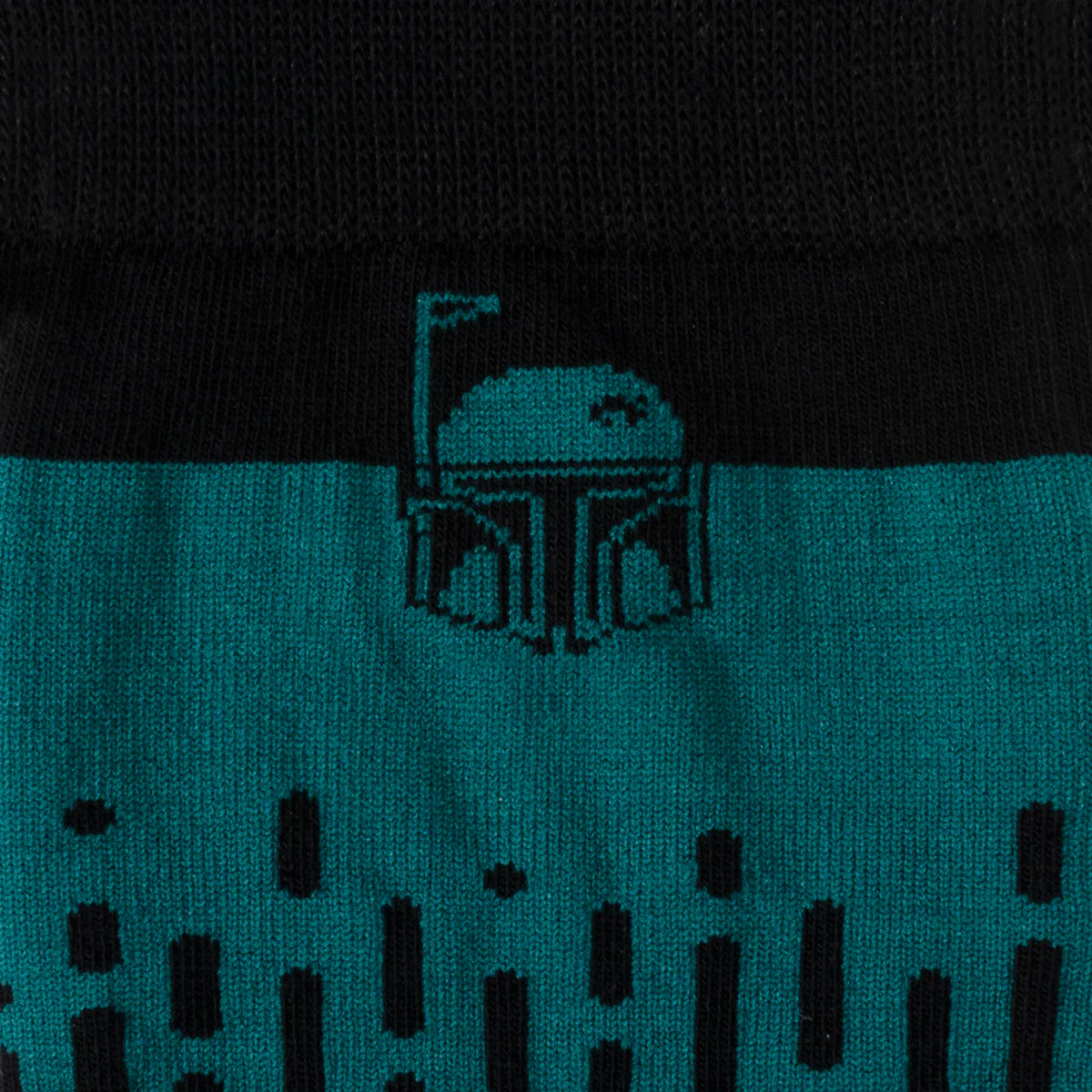 The Star Wars Boba Fett Green Dress Socks and Crest Lapel Pin Gift Set by Cufflinks.com features stylish green socks and a Boba Fett lapel pin—perfect for any Star Wars fan.