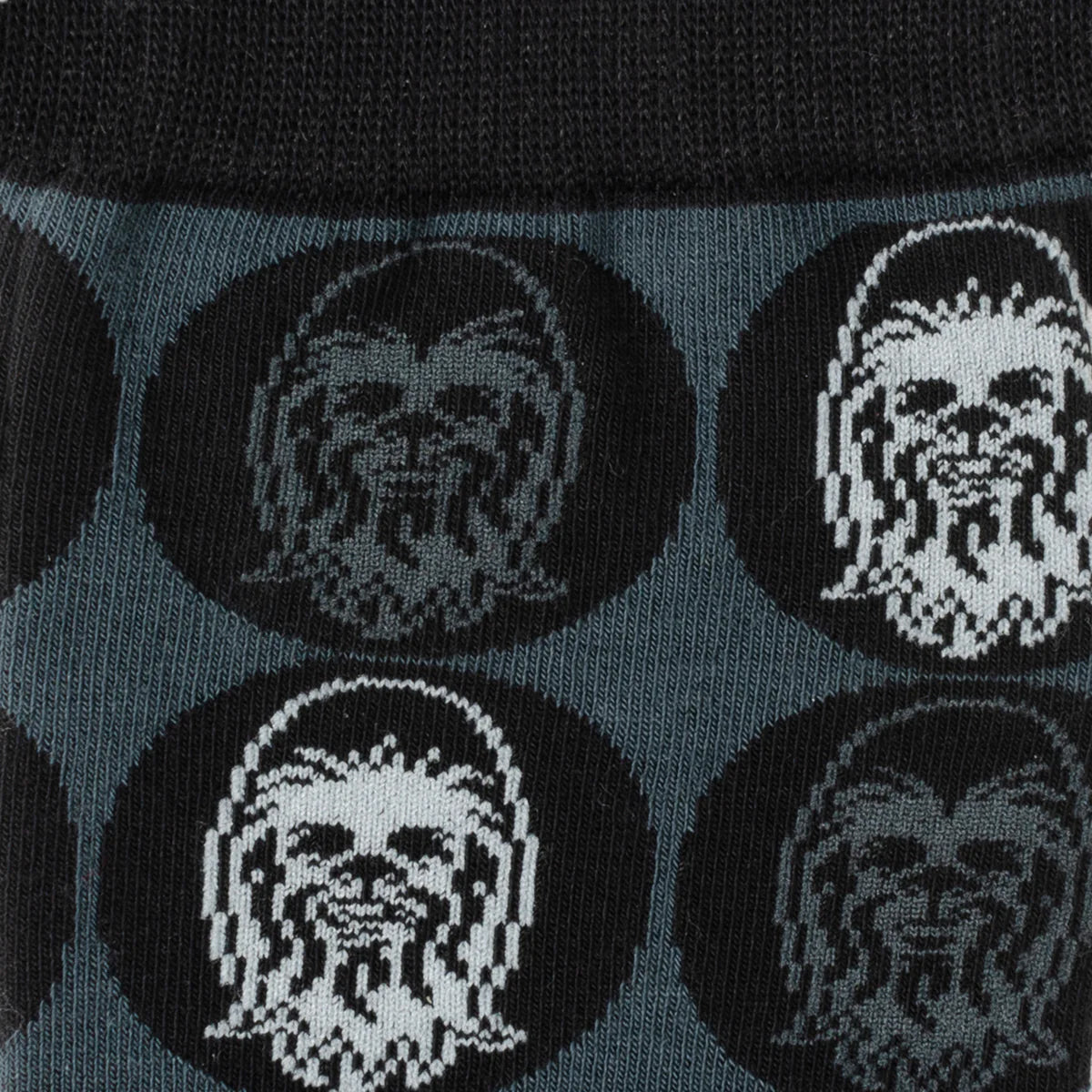 The Star Wars Chewbacca Black Dress Socks and Rebel Alliance Starbird Crest Lapel Pin Gift Set by Cufflinks.com includes Chewbacca-themed socks and a metallic lapel pin—an ideal gift for Star Wars fans.