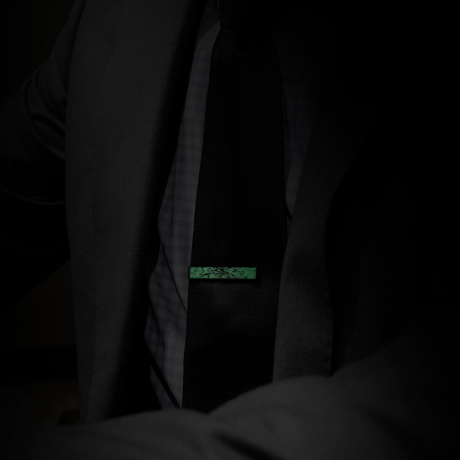 A black metal money clip with a silver geometric burst design, ideal for pairing with the Cufflinks.com Star Wars Hyperspace Glow-in-the-Dark Tie Bar.