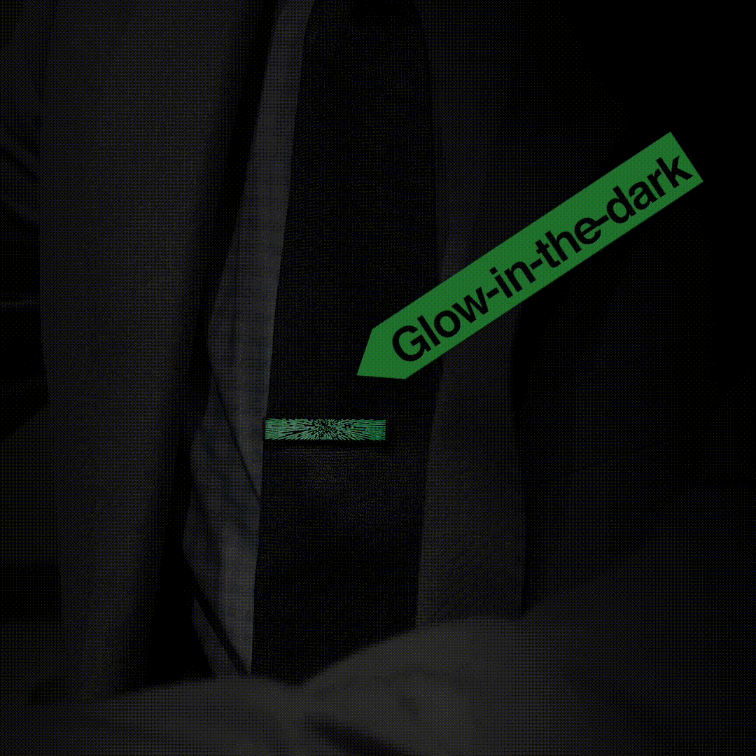 A black metal money clip with a silver geometric burst design, ideal for pairing with the Cufflinks.com Star Wars Hyperspace Glow-in-the-Dark Tie Bar.