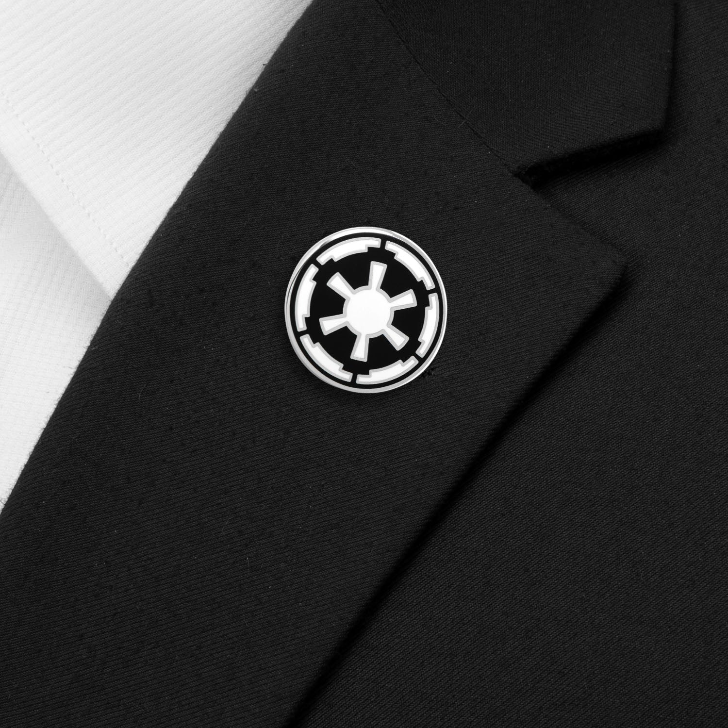 The Star Wars Imperial Crest Lapel Pin by Cufflinks.com is a licensed black-and-white accessory featuring the iconic Empire emblem with a central hexagon and radiating spokes.