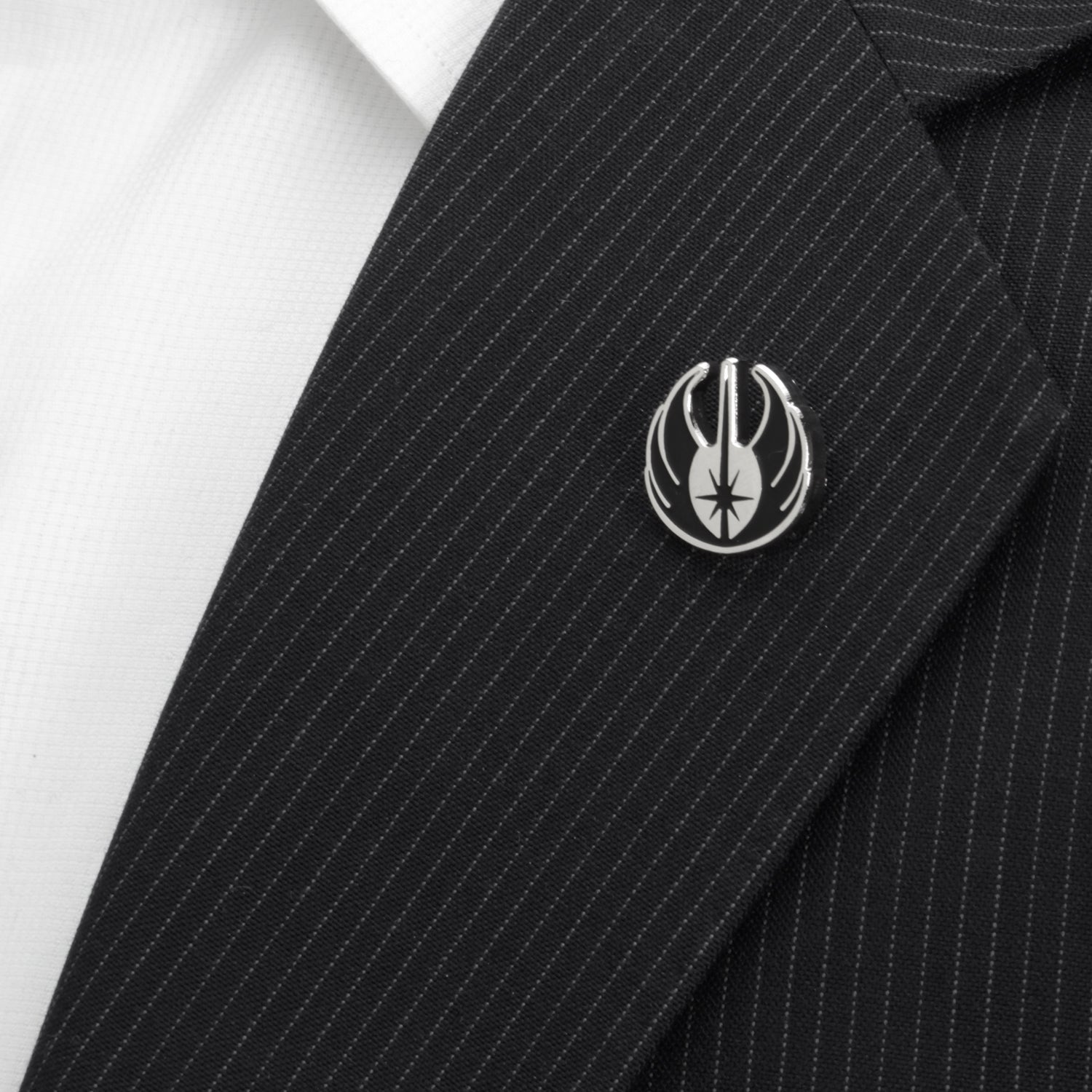 The Cufflinks.com Star Wars Jedi Crest Lapel Pin displays the black and white Jedi Order symbol on a metal finish, shown against a white background.