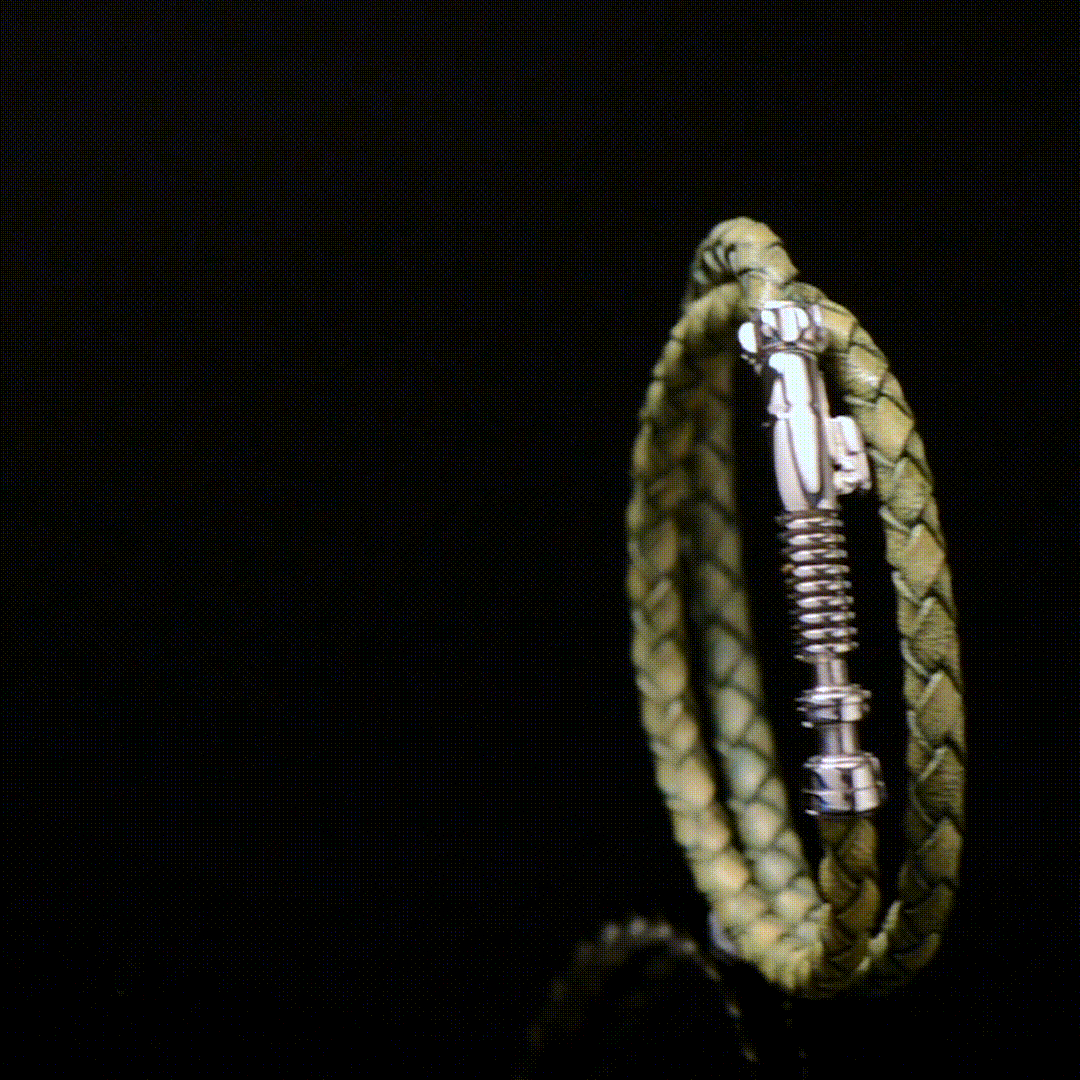 The Star Wars Luke Skywalker LIGHTSABER Bracelet by Cufflinks.com is a green men's leather bracelet with a metallic clasp inspired by Luke's lightsaber—ideal for any fan’s collection.