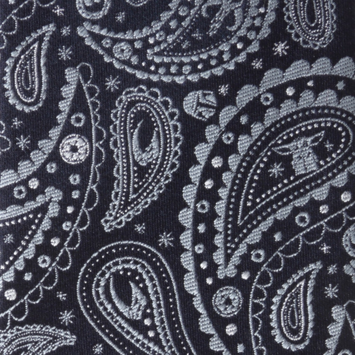 The Star Wars Mandalorian Blue Paisley Tie by Cufflinks.com features a subtle white pattern, making it an ideal accessory for fans wanting a classy nod to their favorite galaxy.