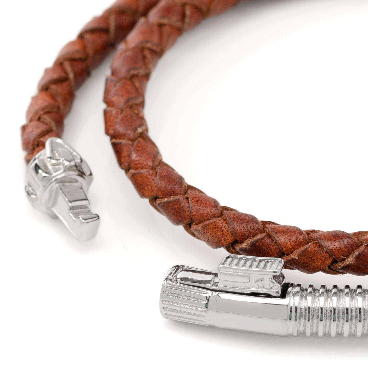 The Star Wars Obi-Wan Kenobi LIGHTSABER Bracelet by Cufflinks.com features brown braided leather and a lightsaber hilt clasp—a distinctive accessory for any Star Wars fan.