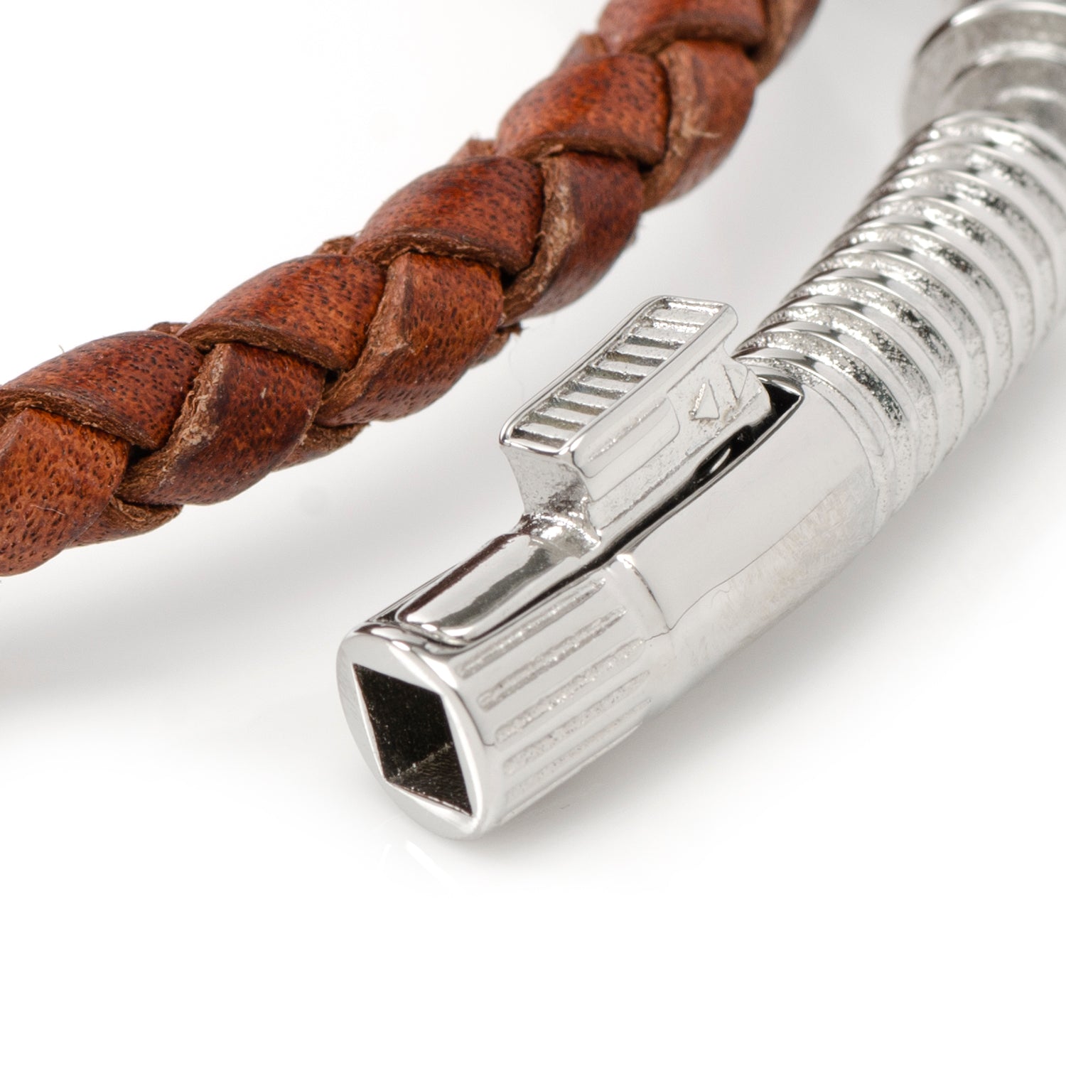 The Star Wars Obi-Wan Kenobi LIGHTSABER Bracelet by Cufflinks.com features brown braided leather and a lightsaber hilt clasp—a distinctive accessory for any Star Wars fan.