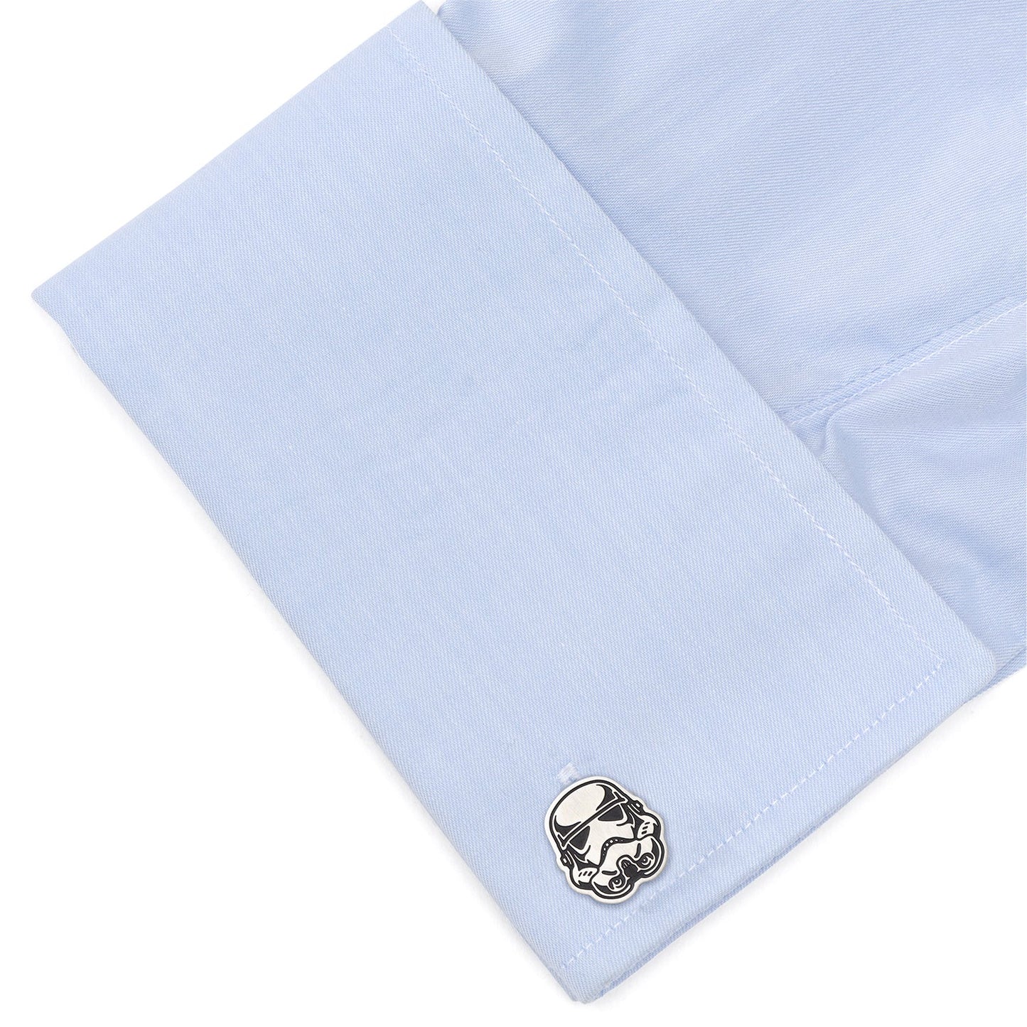 The Star Wars Stormtrooper Stainless Steel Cufflinks by Cufflinks.com include one stormtrooper helmet-shaped cufflink and one round cufflink engraved with "Star Wars.