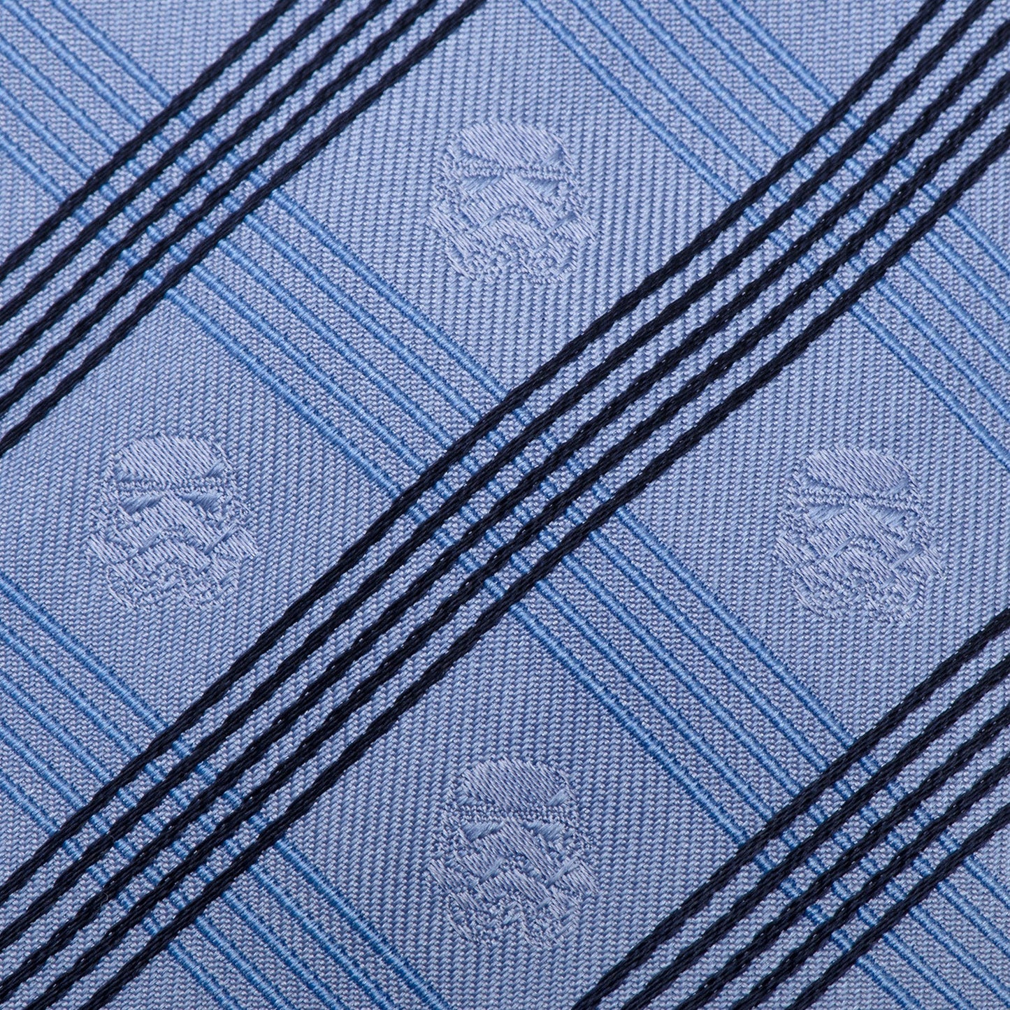 The Star Wars Stormtrooper Blue Plaid Tie by Cufflinks.com features diagonal black and light blue stripes with a subtle embossed pattern—ideal for fans seeking a refined, stylish Star Wars accessory.