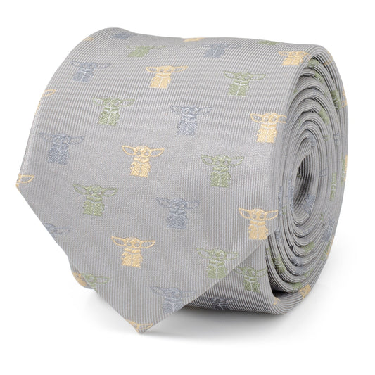 The Cufflinks.com Star Wars Grogu Dotted Green Tie is a light gray silk tie with a repeating pattern of small, colorful Grogu designs inspired by The Child.