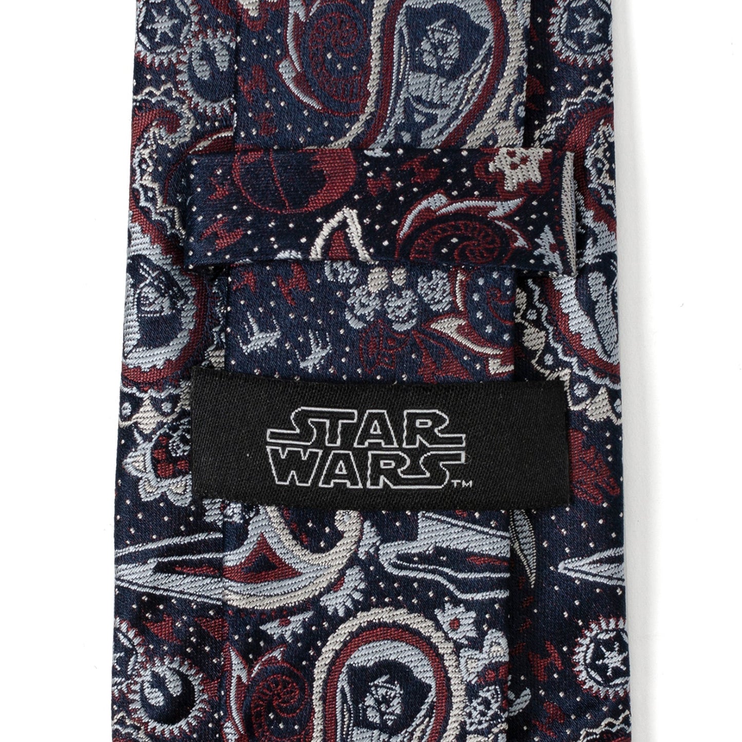 The Star Wars Darth Vader Navy Multicolored Paisley Tie by Cufflinks.com features a paisley pattern in red, white, and gray on navy—an officially licensed silk tie from Lucasfilm.