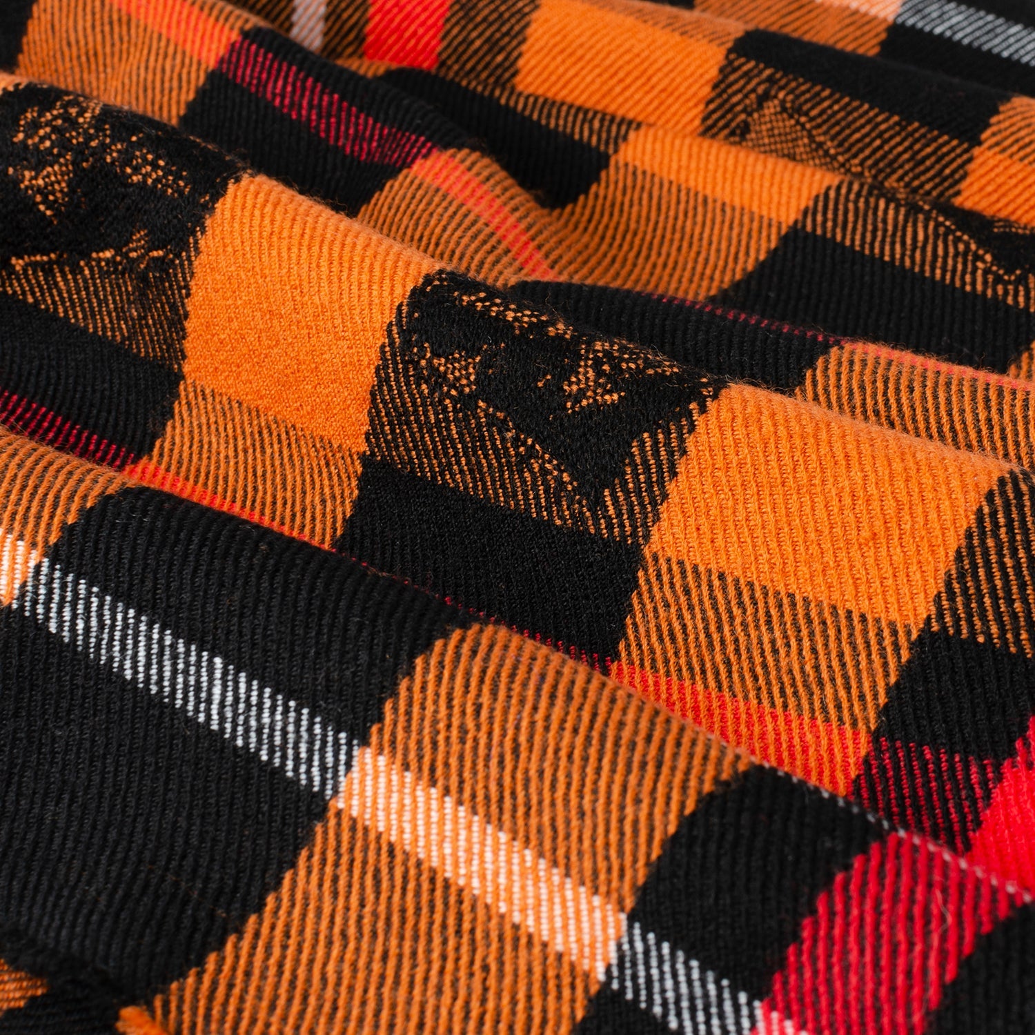 The Star Wars Darth Vader Black Tartan Scarf by Cufflinks.com features orange, black, red, and brown plaid, fringe edges, and Star Wars-inspired embroidered patches.