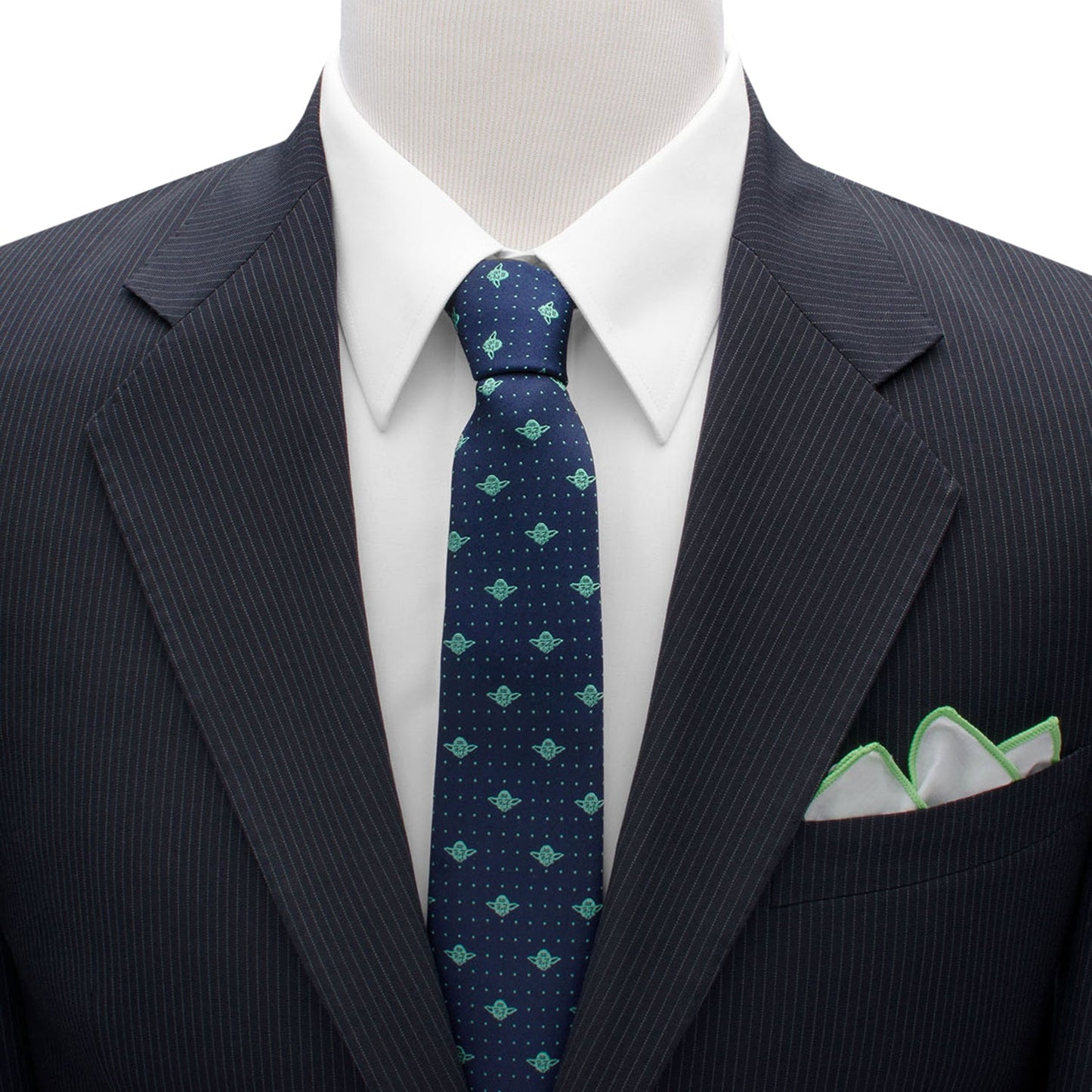 The Star Wars Yoda Dotted Navy Tie by Cufflinks.com features a playful pattern of small green Grogu faces and dotted accents—a fun accessory for Star Wars fans.