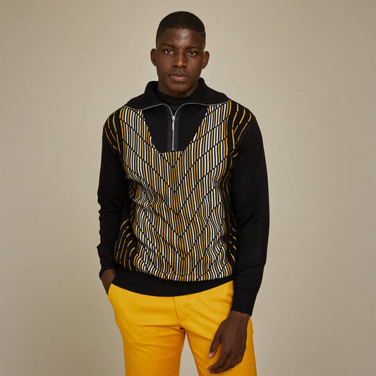 A man stands against a plain background, wearing the Inserch Geo Intarsia Half-Zip Sweater SW608-01 Black with yellow and white geometric patterns, paired with bright yellow pants.