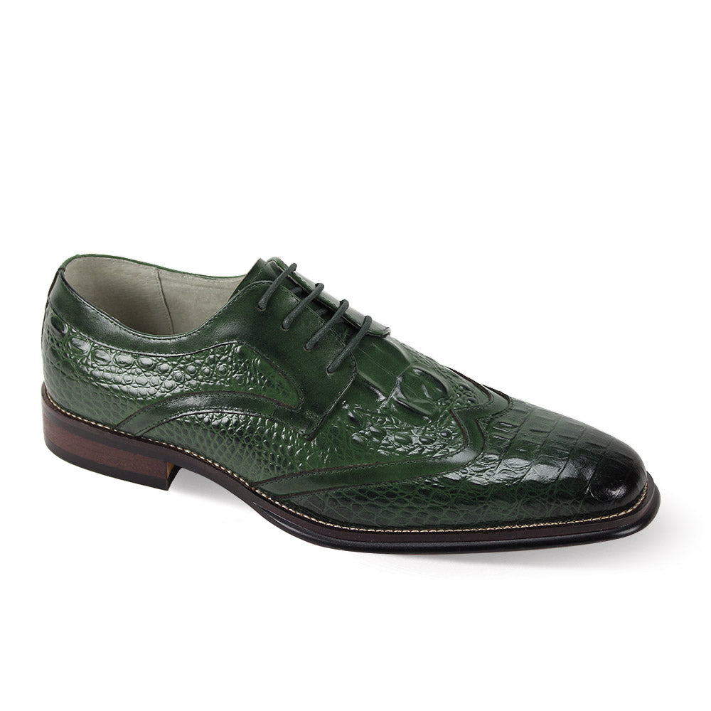 Introducing the Giovanni Shane Green Leather Shoes by GIOVANNI, a stylish wingtip dress shoe crafted from green crocodile-patterned leather, accented with a brown sole and sleek black laces.