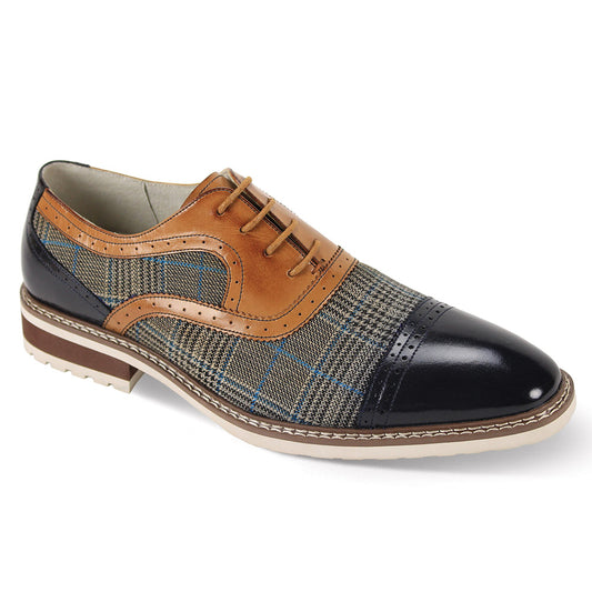 GIOVANNI's Giovanni Sinclair shoes showcase a refined design, blending navy and tan leather with a plaid fabric pattern and a chic tan sole. The sophisticated cap toe enhances elegance, while the lace-up closure guarantees a precise fit.