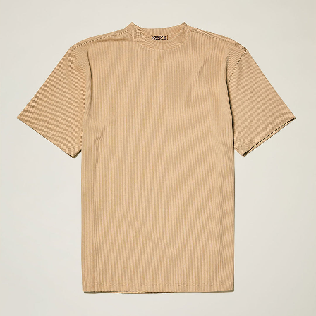 The Inserch Rib Crew Neck T-Shirt T299-00084 Tan by Inserch is laid flat on a light background, showcasing its plain beige design in soft rib jersey knit with no graphics or patterns.