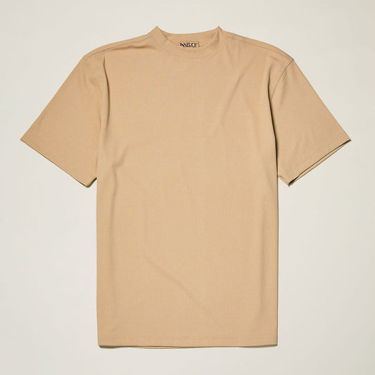 The Inserch Rib Crew Neck T-Shirt T299-00084 Tan by Inserch is laid flat on a light background, showcasing its plain beige design in soft rib jersey knit with no graphics or patterns.