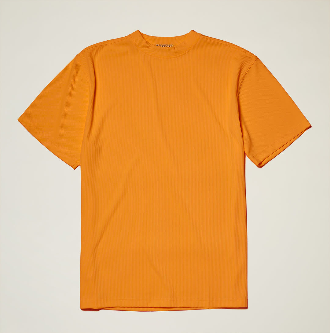 The Inserch Rib Crew Neck T-Shirt T299-00097 Melon by Inserch is a soft polyester-spandex blend, short-sleeve, orange crew neck tee, shown laid flat on a light background.
