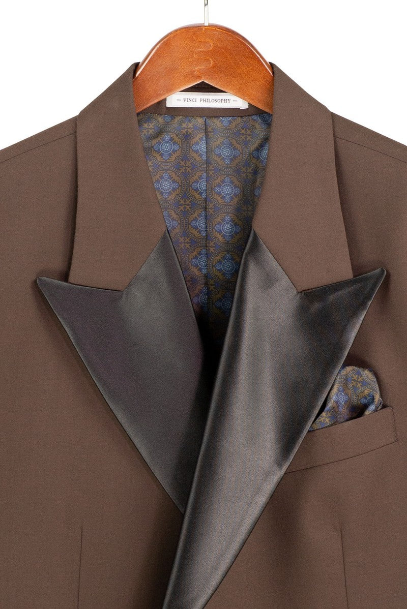 Regular Fit Brown 2 Piece Double Breasted Satin Lapel Tuxedo TDB-900 by Vinci Suits, styled with a blue shirt, black bow tie, pocket square, and lapel pin on a mannequin.