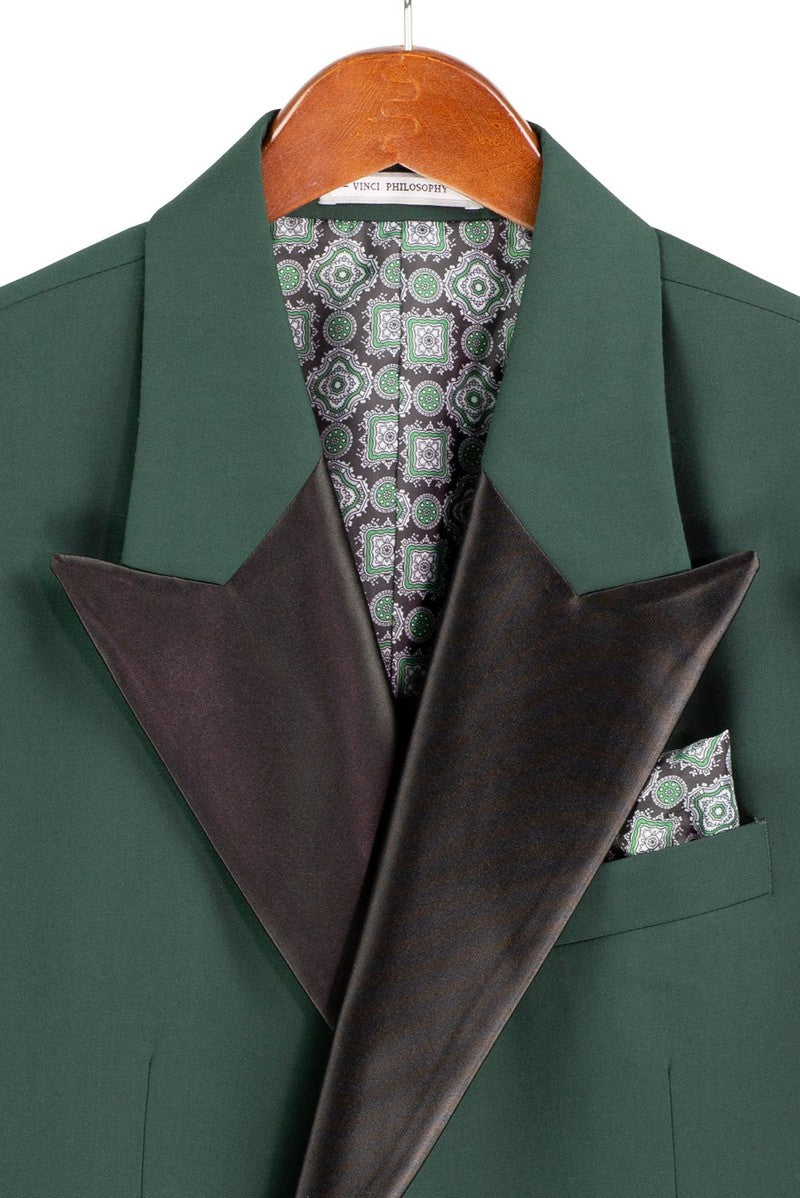Mannequin dressed in the Regular Fit Hunter Green 2 Piece Double Breasted Satin Lapel Tuxedo TDB-900 by Vinci Suits, paired with a black shirt and bow tie.
