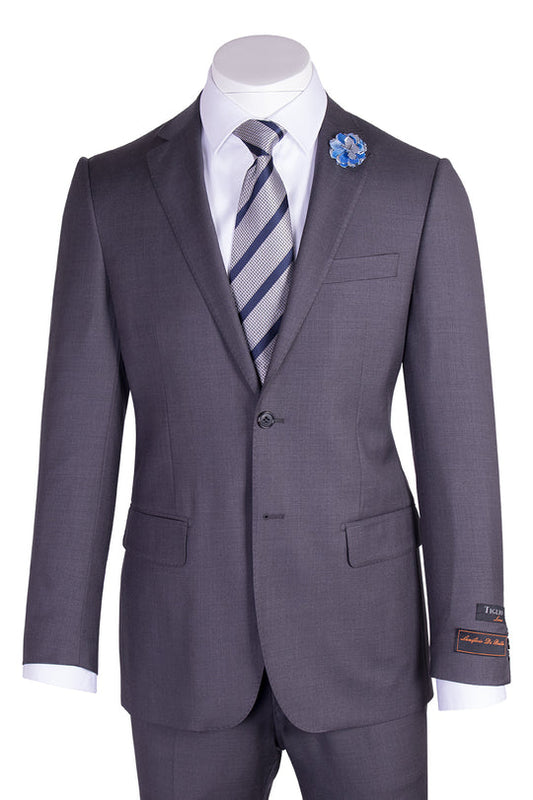 The Tiglio Luxe Novello Medium Gray Pure Wool Men’s Suit TIG1008 features a white dress shirt, striped tie, blue flower lapel pin, and a left sleeve label—Tiglio Luxe luxury fashion for men, displayed on a headless mannequin.