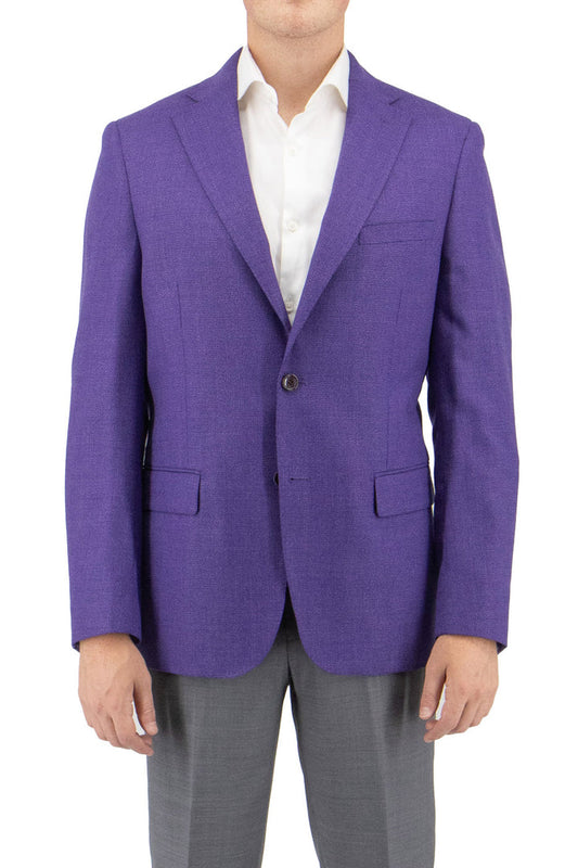 A person wearing the Tiglio Luxe Violet Dolcetto Modern Fit Pure Wool Jacket TL3375, a finely crafted garment from Italian fabrics, paired with a white shirt and gray pants, stands with their hands by their sides against a plain white background.