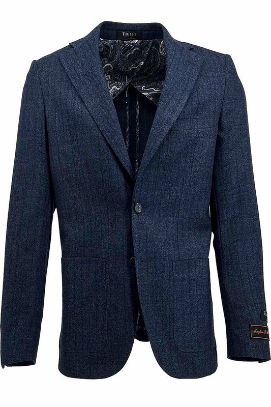 The Tiglio Luxe Dolcetto/THP Modern Fit Half Lined Jacket, model TL3320, is a dark blue denim with stripes blazer. It features two buttons, front flap pockets, and an elegant paisley interior lining crafted from pure Italian wool, exemplifying tailored men's clothing with European elegance.