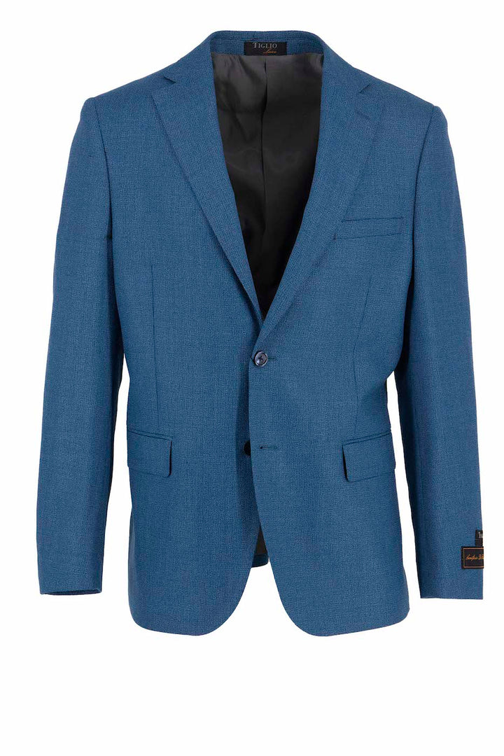 The Tiglio Luxe Teal Dolcetto Modern Fit Jacket (TL3378) is crafted from pure wool, featuring two buttons, notched lapels, and two front pockets. The interior boasts black lining made with exquisite Italian fabrics.