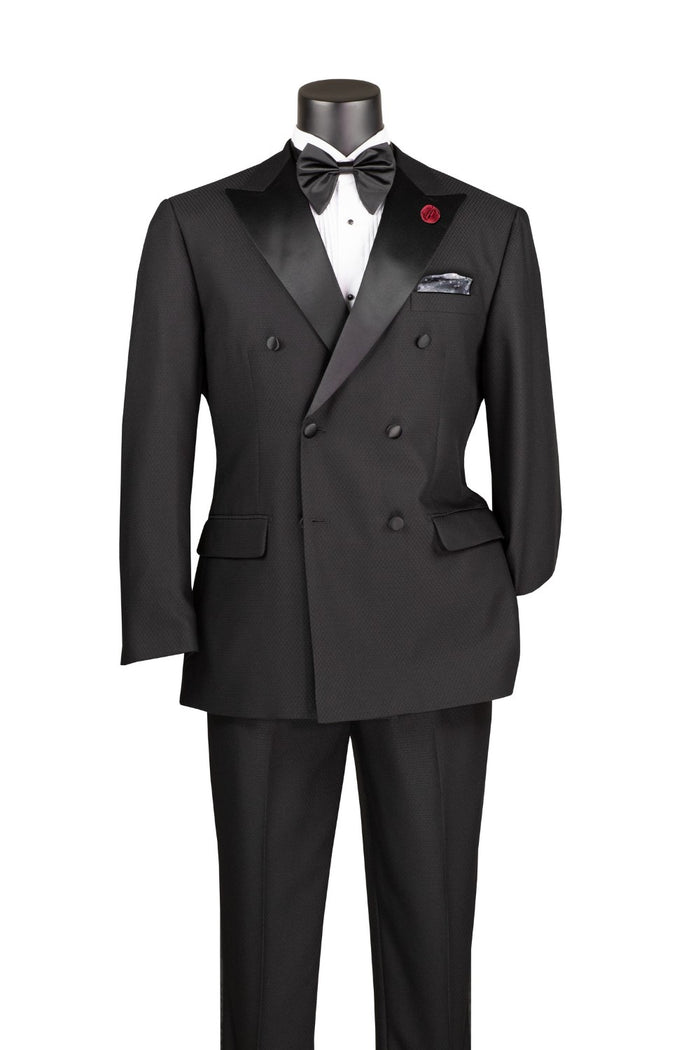 The Vinci Suits Modern Fit Double Breasted Tuxedo TMDB-1 in black, featuring an adjustable waistband and paired with a white dress shirt, oversized black bow tie, and crisp white pocket square on a mannequin.