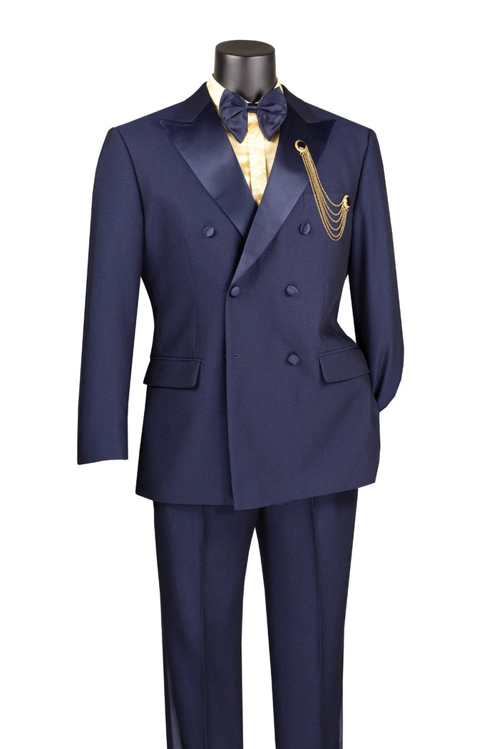 A mannequin displays the Vinci Suits Modern Fit 2 Piece Double Breasted Tuxedo with an adjustable waistband and oversized bow tie in navy (TMDB-1) against a white backdrop.